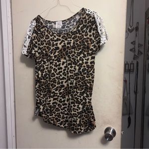 Leopard print top with lace trimming design on sleeves